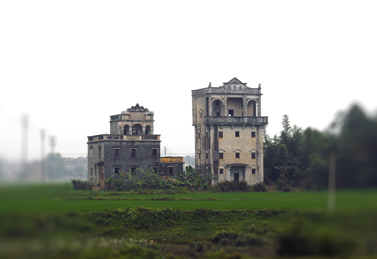 Kaiping diaolou towers among rice fields