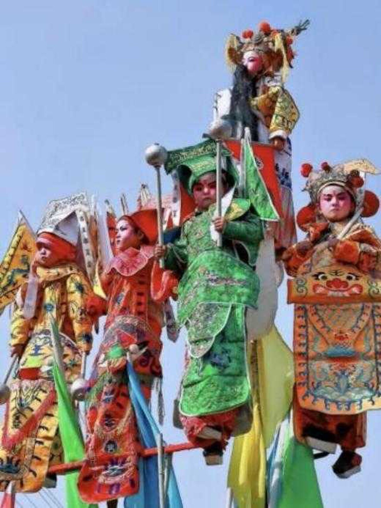Shehuo folk performance in Shanxi with dancers in bright costumes