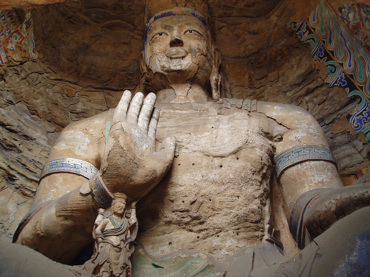 Giant Buddha statues carved into the cliff at Yungang Grottoes, Datong